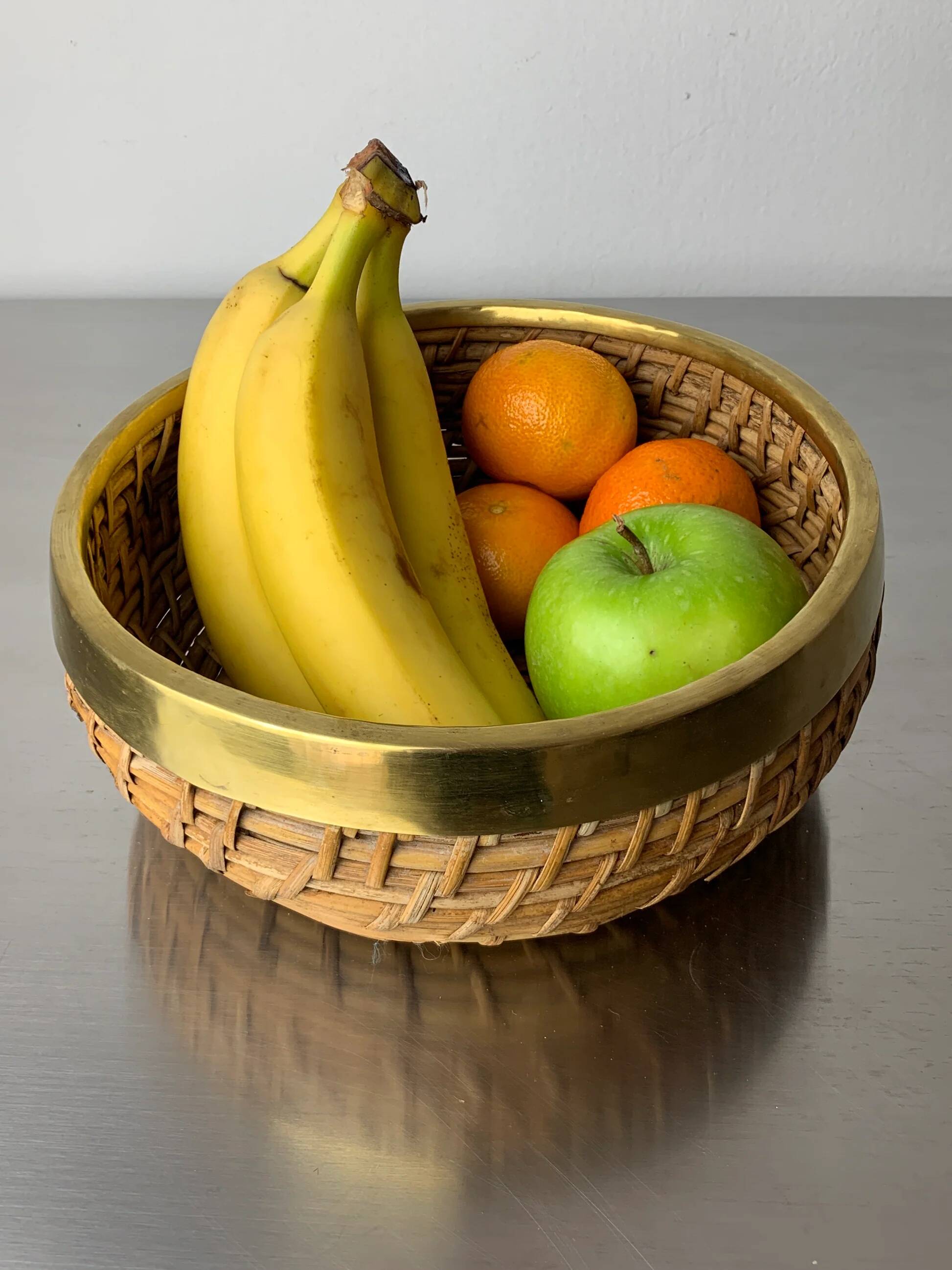 Circular rattan and brass basket, Italy, 1970s