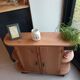 Small buffet or console in natural and black wood
