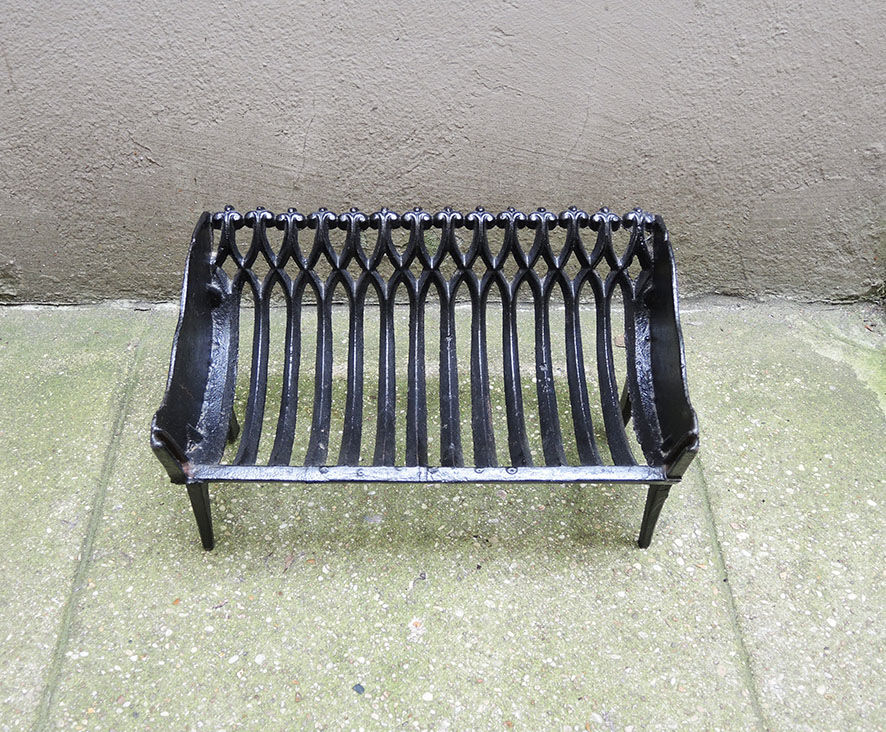 Old gate, cradle with cast iron logs