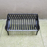 Old gate, cradle with cast iron logs