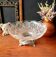 Transparent glass dish on vintage metal stand
