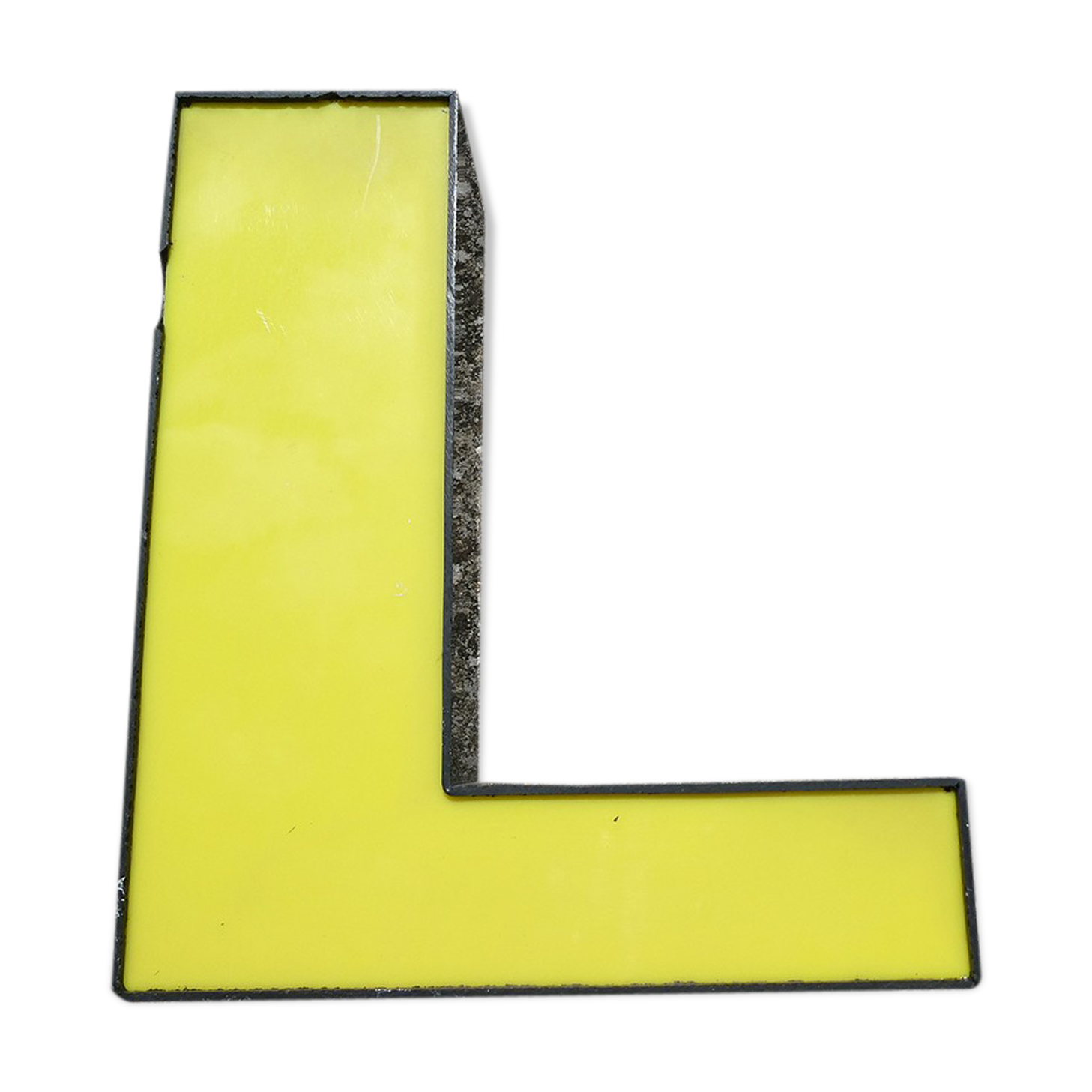 Letter "l" of industrial sign yellow and black