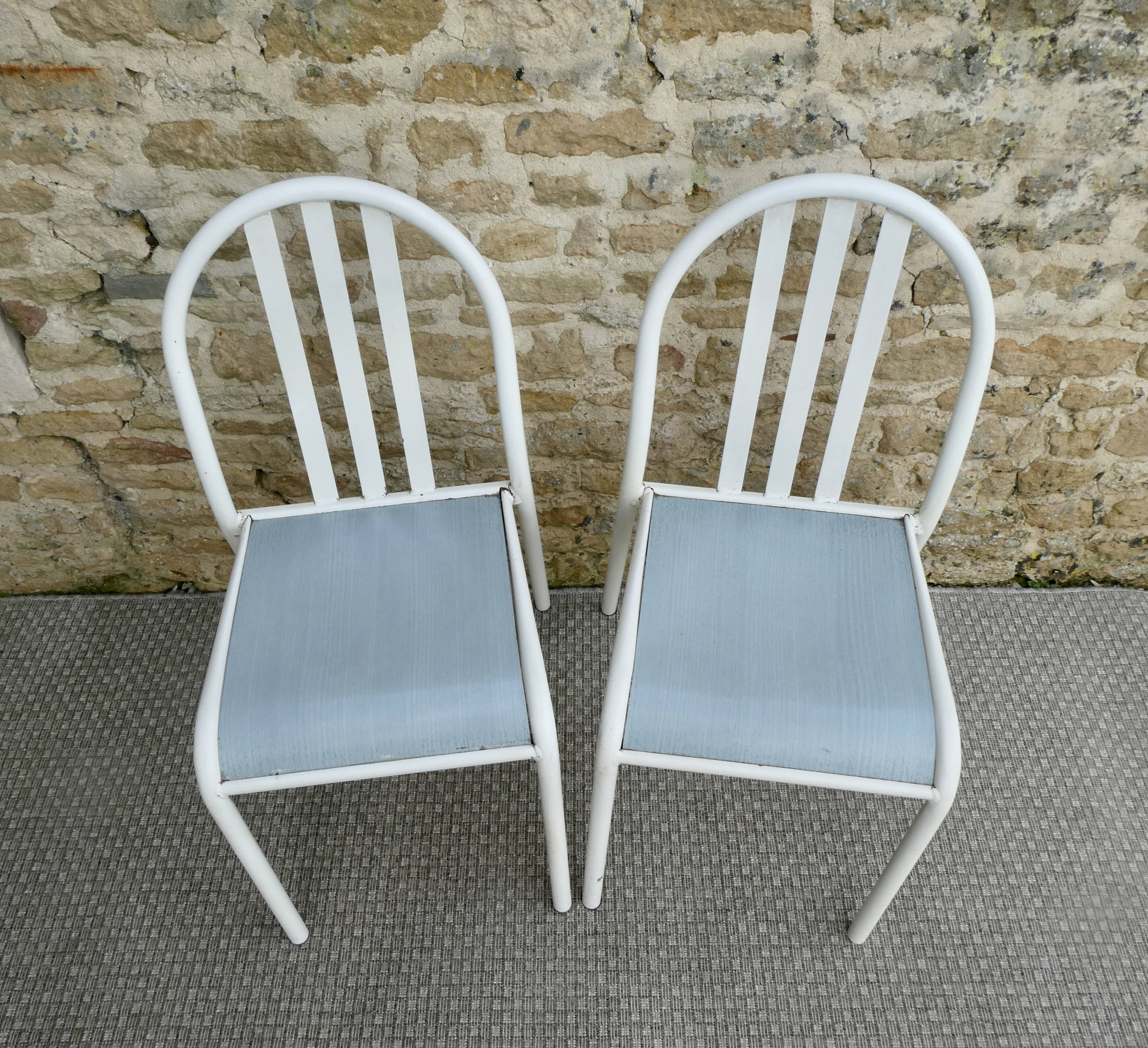 Set of 4 chairs by Robert Mallet-Stevens, 1960s.