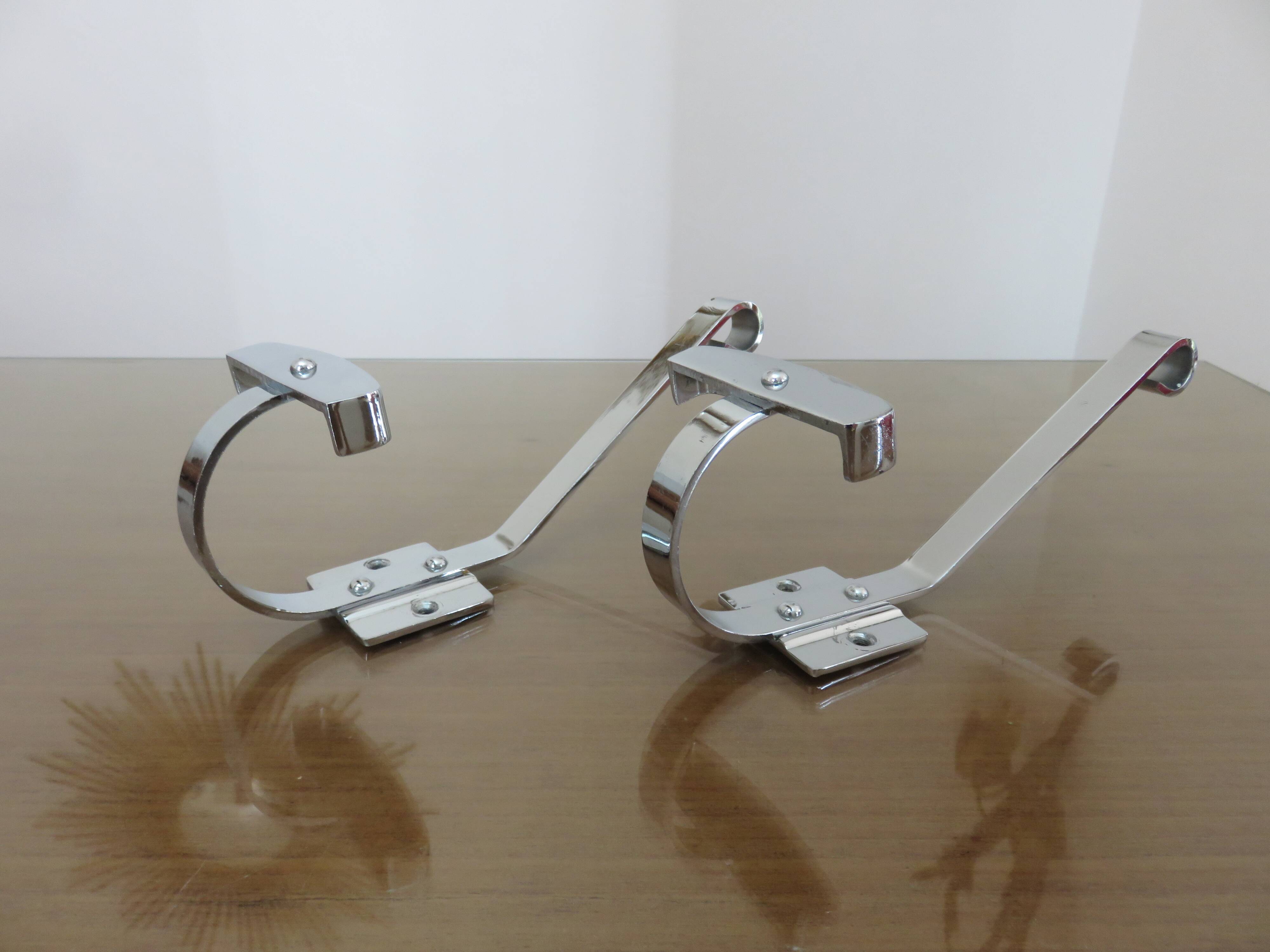 Pair of chrome metal coat hooks from the 1970s.