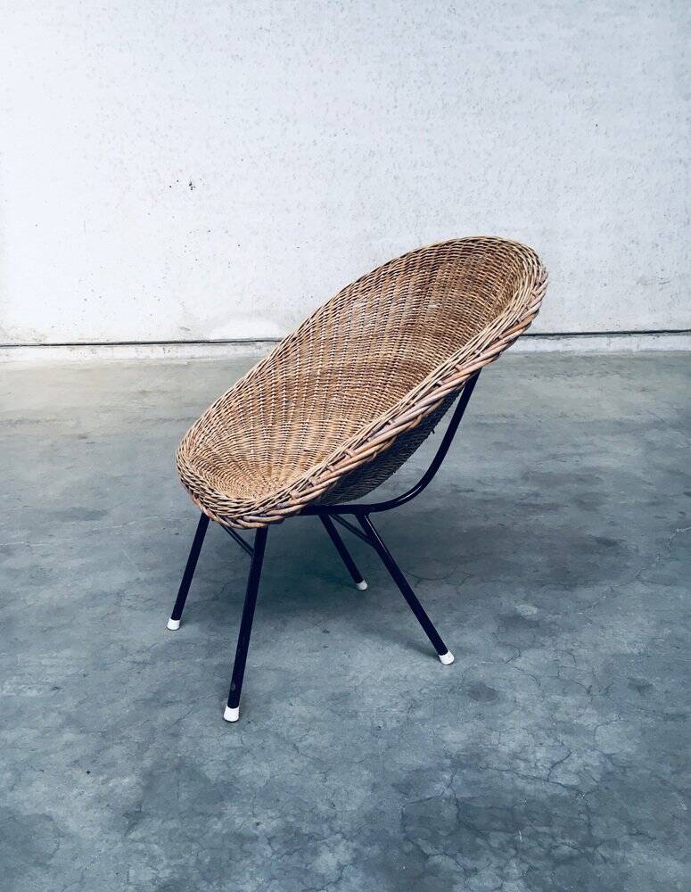 Wicker lounge chair in the style of Dirk Van Sliedregt for Rohé Noordwolde, Netherlands, 1960s.