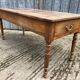 Antique cherry farmhouse table with 2 drawers and 1 pull-out