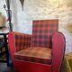 Red faux leather armchair