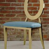 Gold chair with turquoise velvet seat