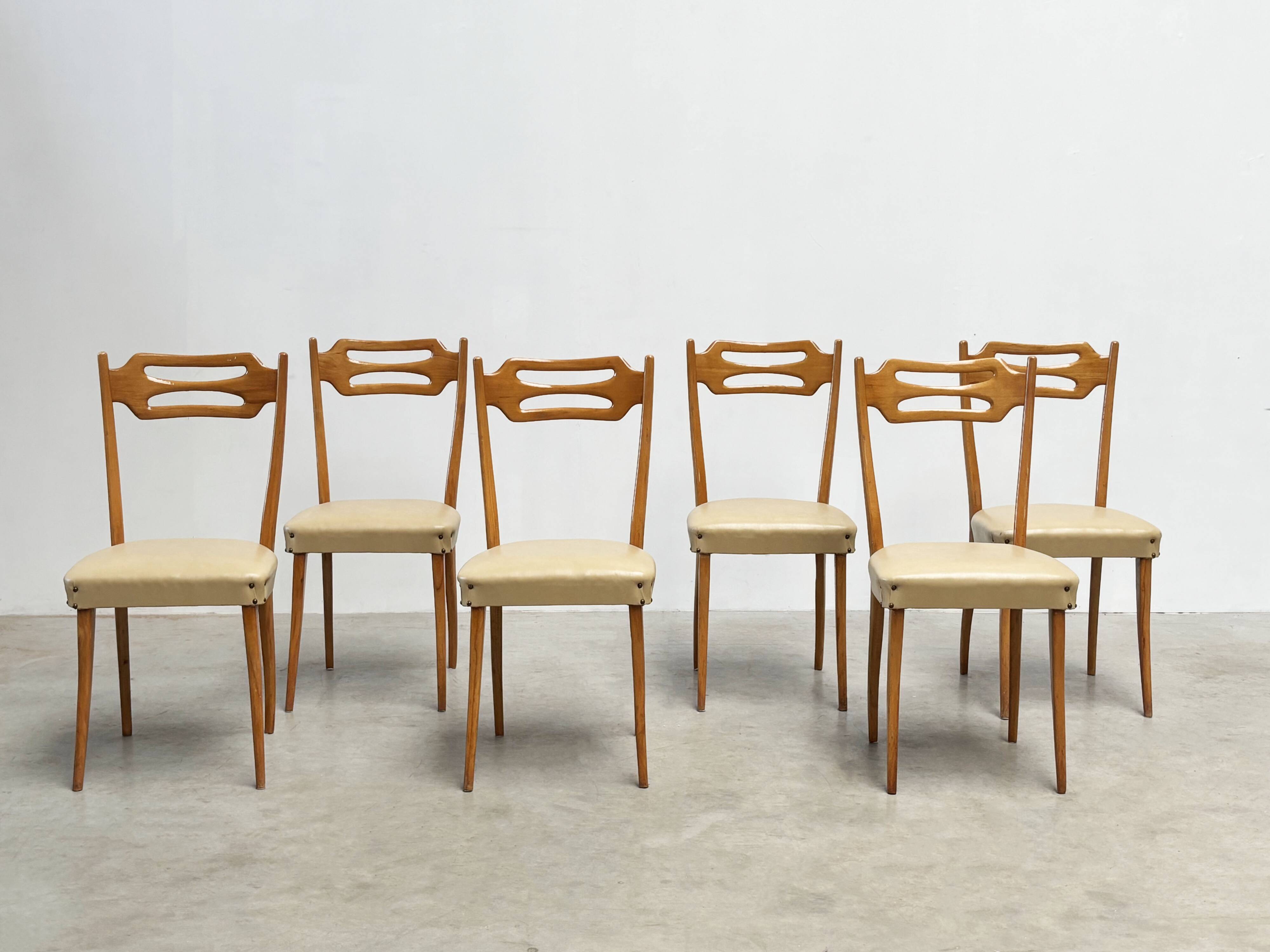Set of six elegant Italian dining chairs