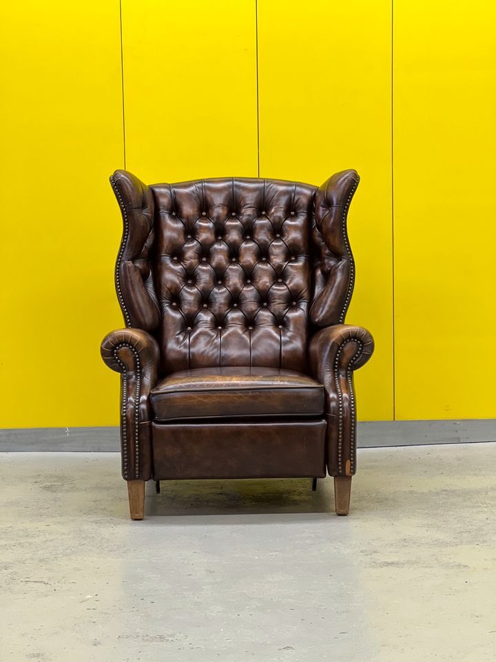 Brown vintage handmade chesterfield recliner armchair