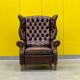 Brown vintage handmade chesterfield recliner armchair