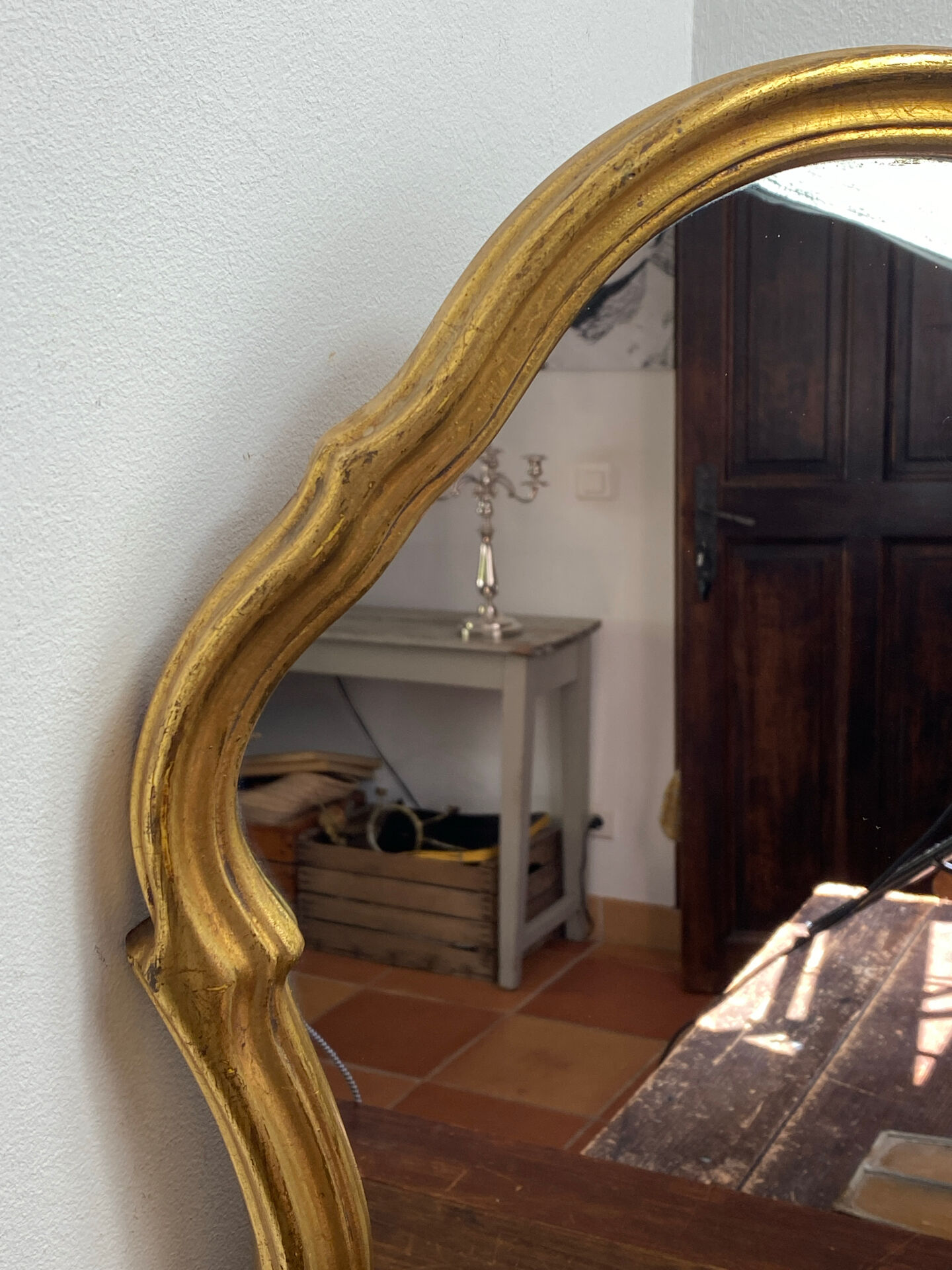 Large baroque mirror in gilded wood