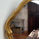 Large baroque mirror in gilded wood