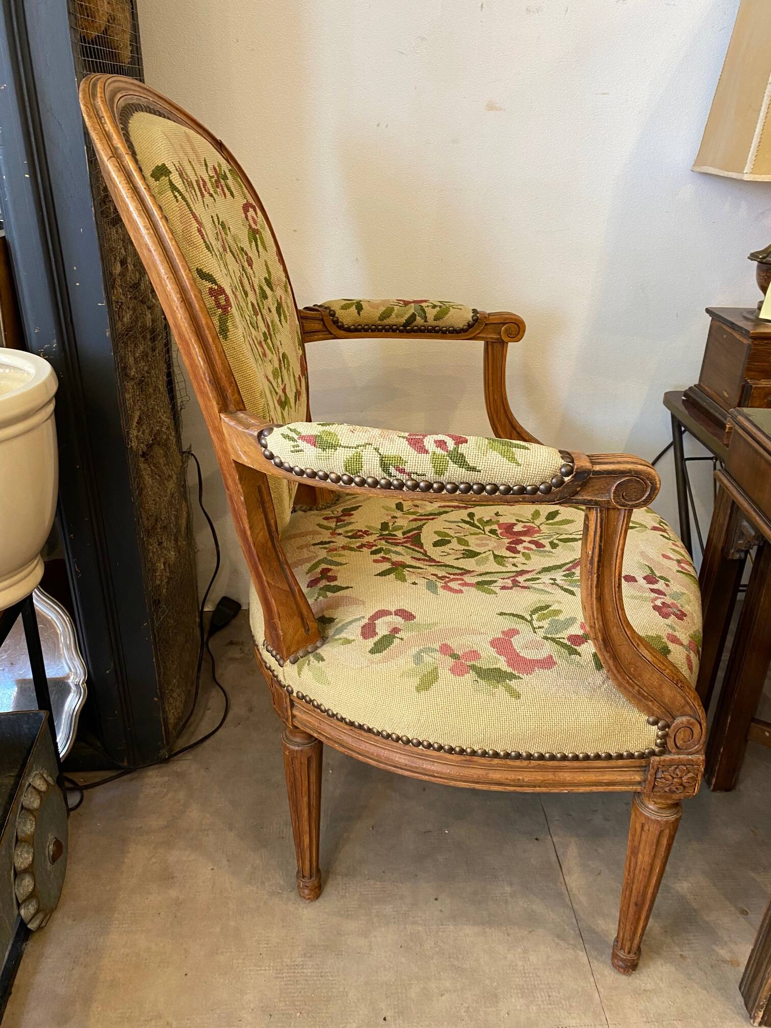Louis XVI style medallion armchair with floral needlepoint tapestry