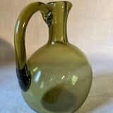 Green blown glass carafe