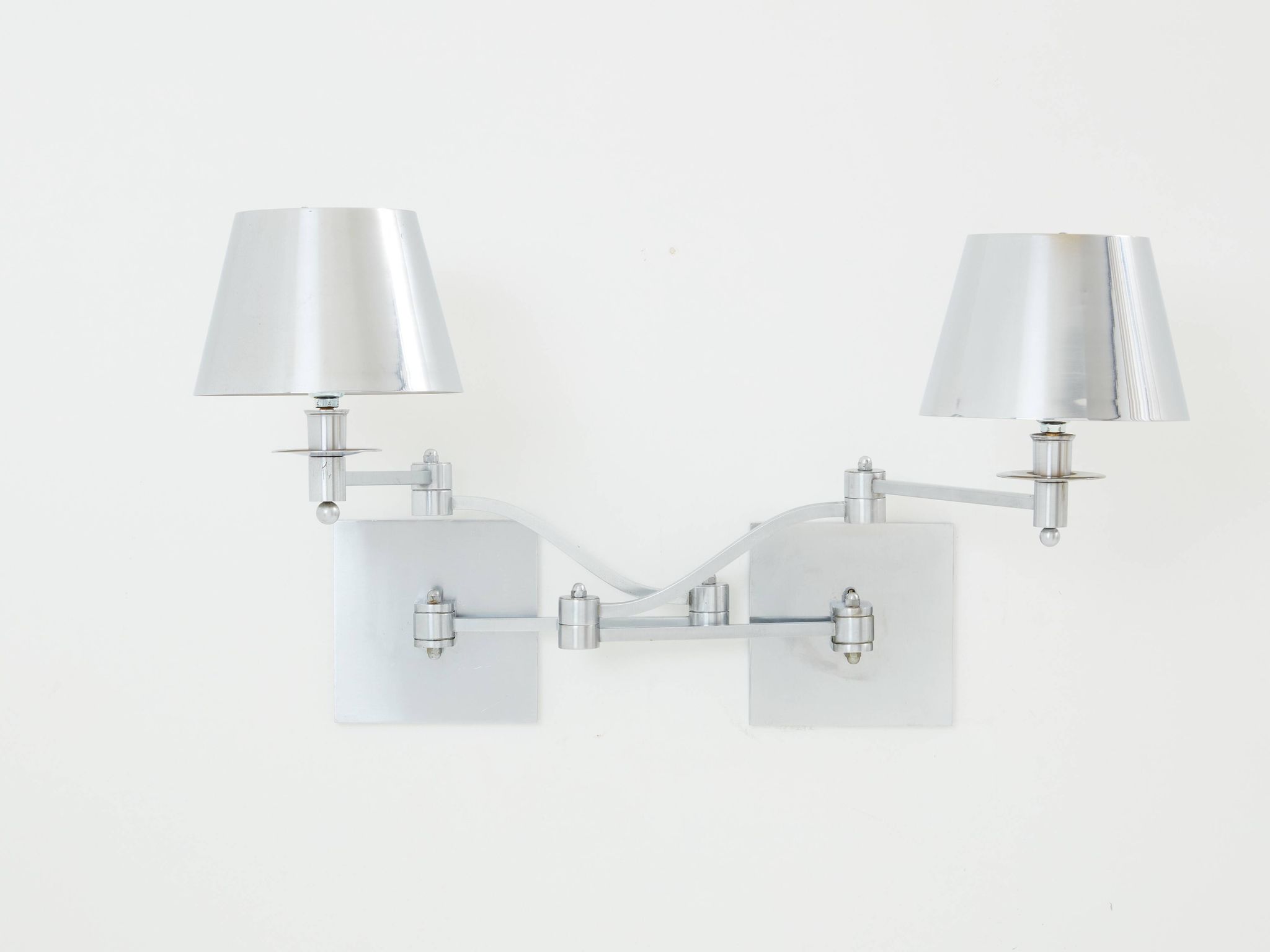 Pair of Maison Charles adjustable brushed steel wall lights circa 1960