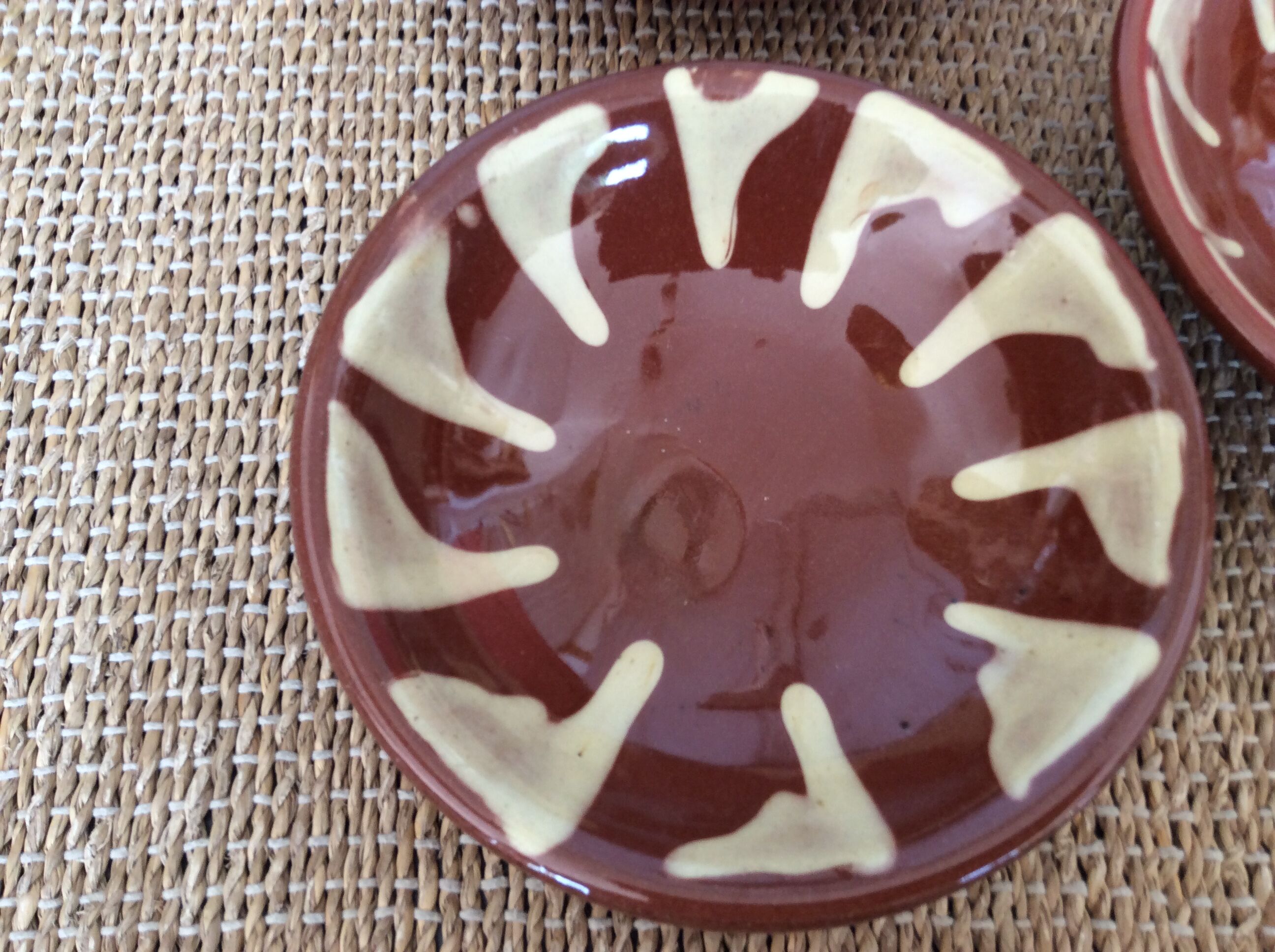 3 glazed terracotta plates