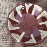 3 glazed terracotta plates