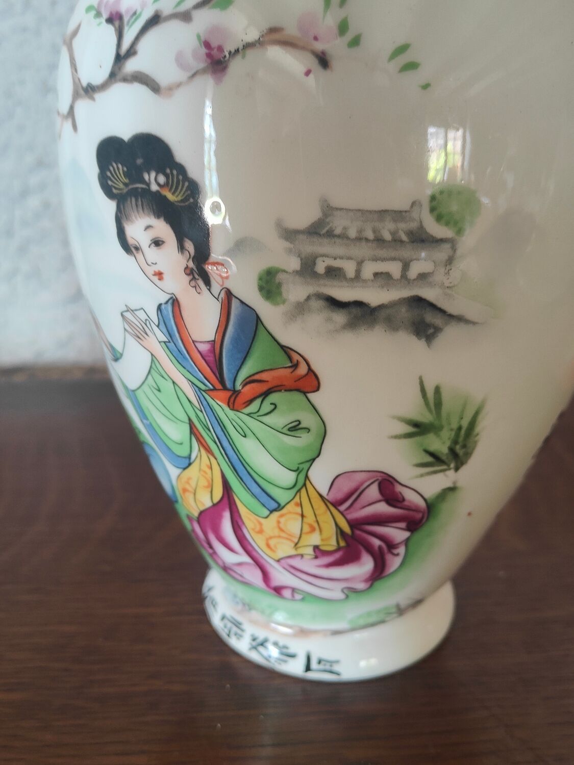 Japanese porcelain vase decorated with 2 geishas and flowering trees