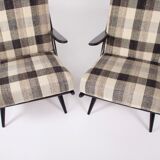 Paire de fauteuils laqués noirs 1950s