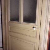 Large glazed door and its old glazed transom.