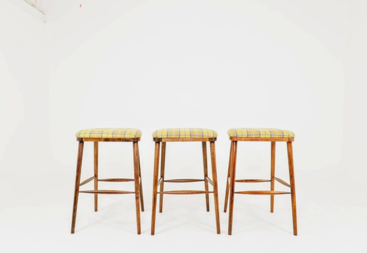Set of three bar stools in vintage style rustic wood wool upholstery