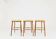 Set of three bar stools in vintage style rustic wood wool upholstery