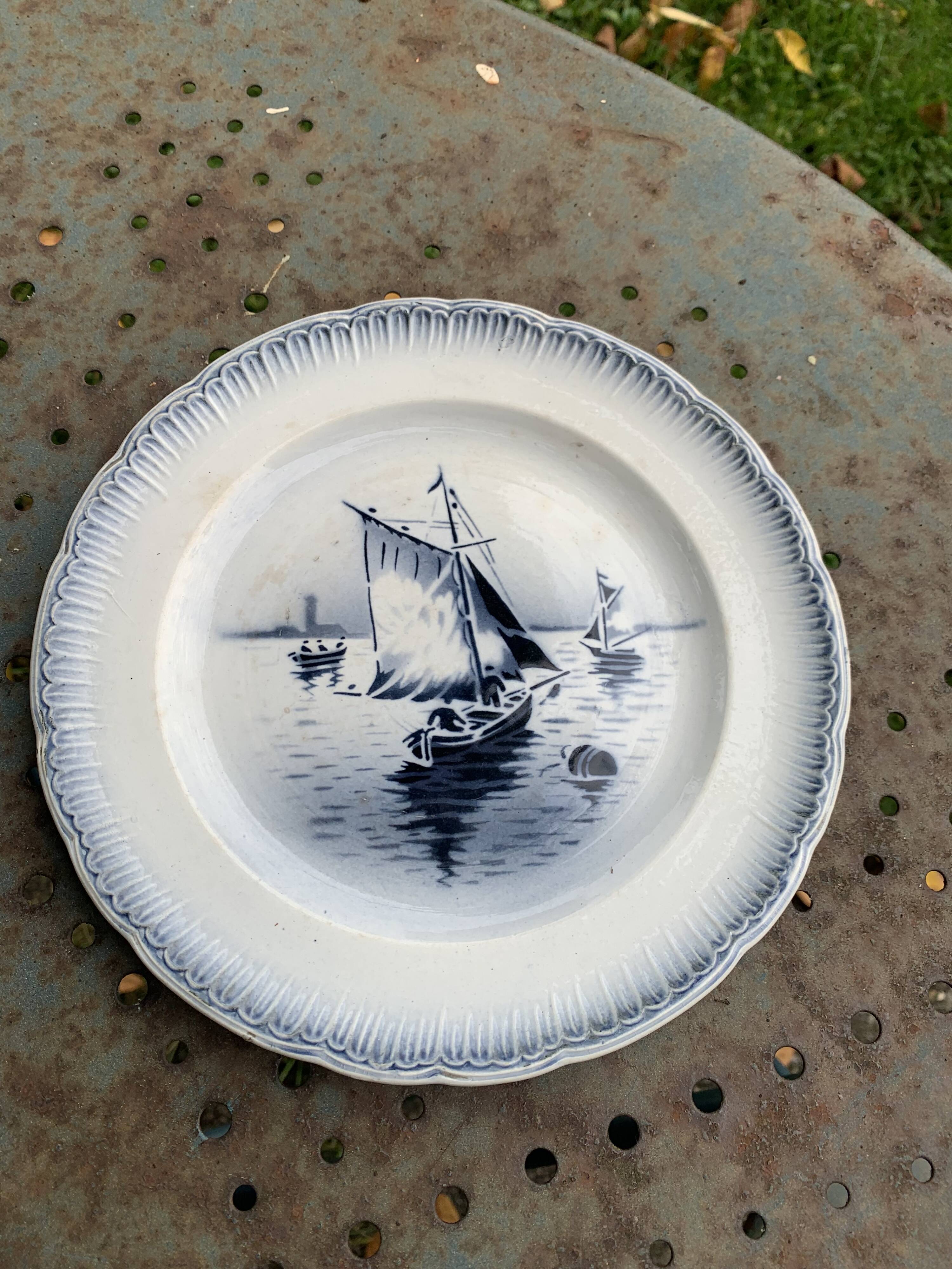 Set of 7 small dessert plates, Saint Amandinoire, Saint Amand decorated with sailboats