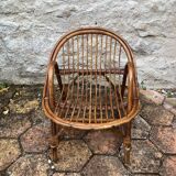 Vintage rattan children's armchair