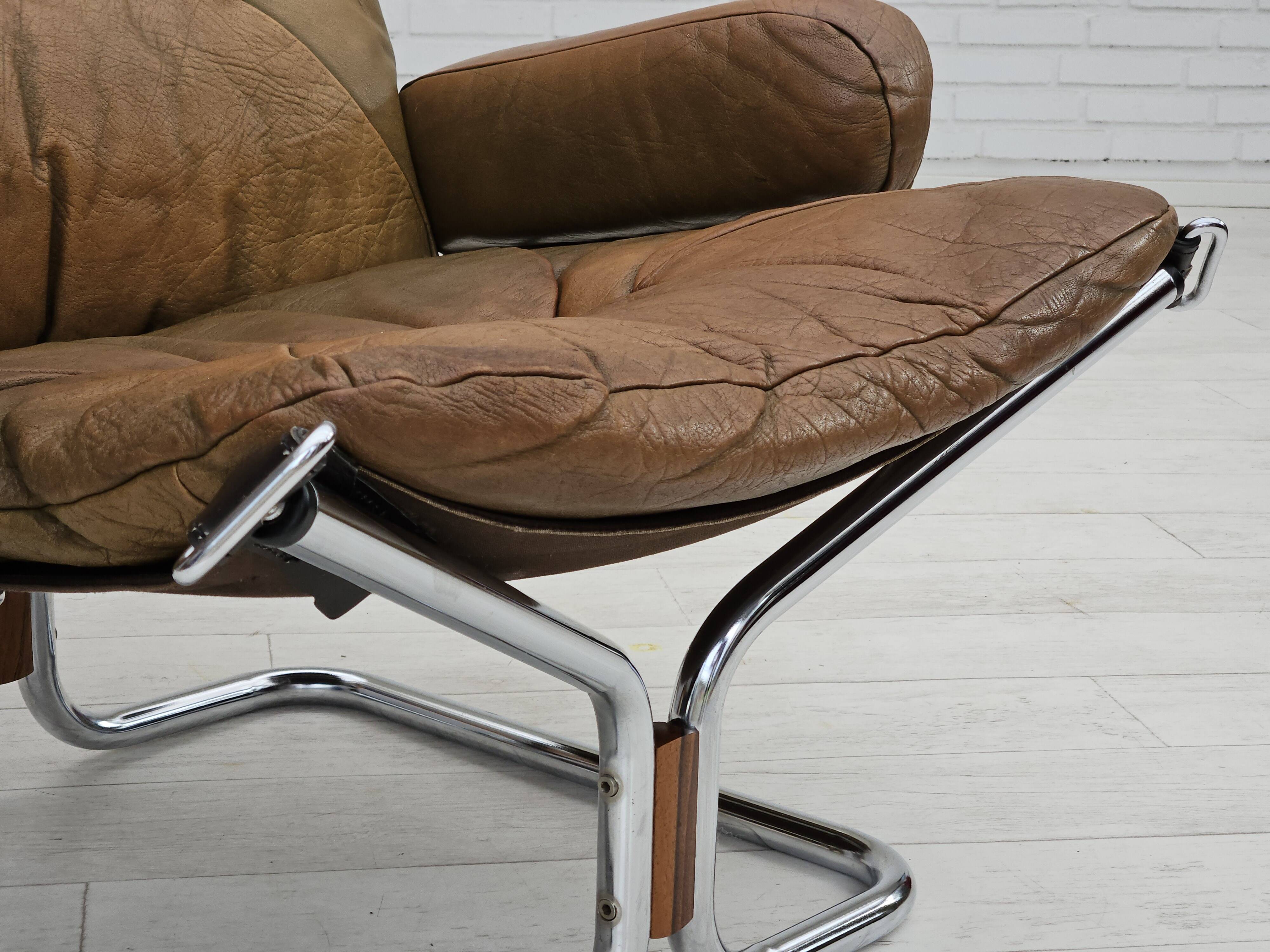 1970s, Norwegian design by Harald Relling, original condition, leather, chrome steel, teak wood.