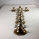 Suite of 11 octagonal brass sconces by Motoko Ishii