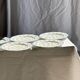 Set of 10 flat plates in Limoges porcelain from France with flowers.