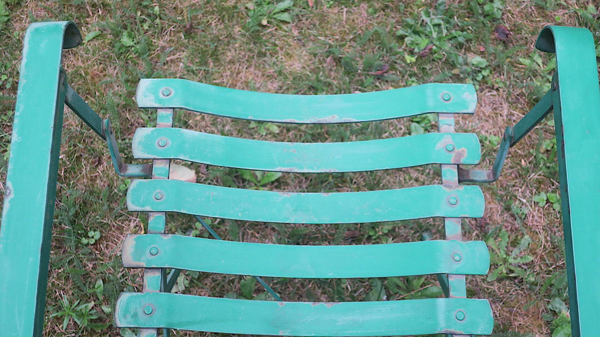Pair of mid century distressed painted iron garden chairs