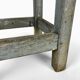 Blue-tinted wooden workshop stool