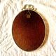 Louis XVI style oval metal wall mirror
