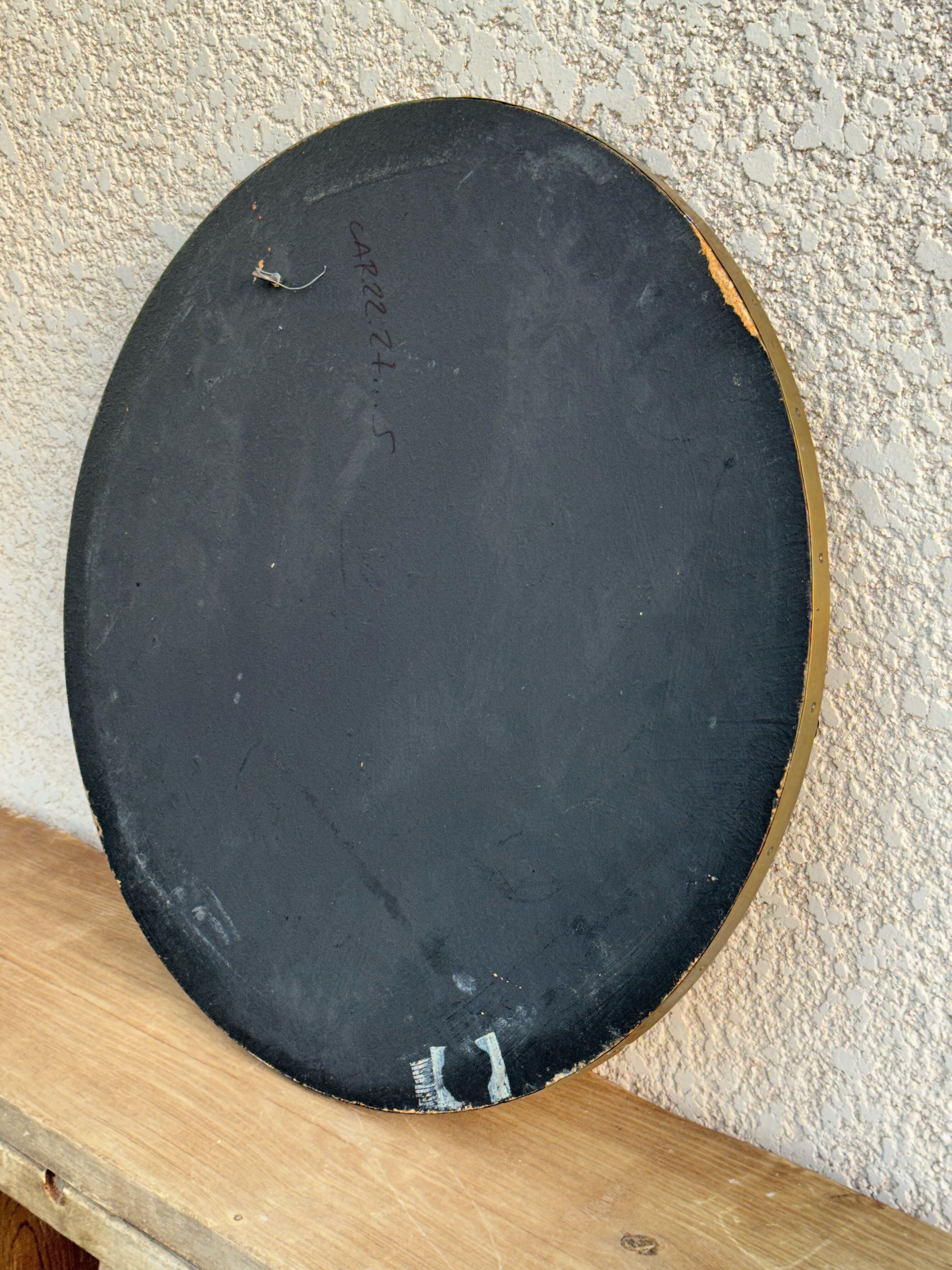 Round mirror in worked copper, Italy 1950