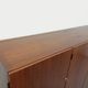 High Scandinavian modernist vintage sideboard in teak and black metal.