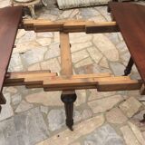 Oval table with extensions in massive mahogany napoleon III era.
