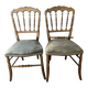 Pair of Napoleon III chairs in gilded wood with velvet upholstery.