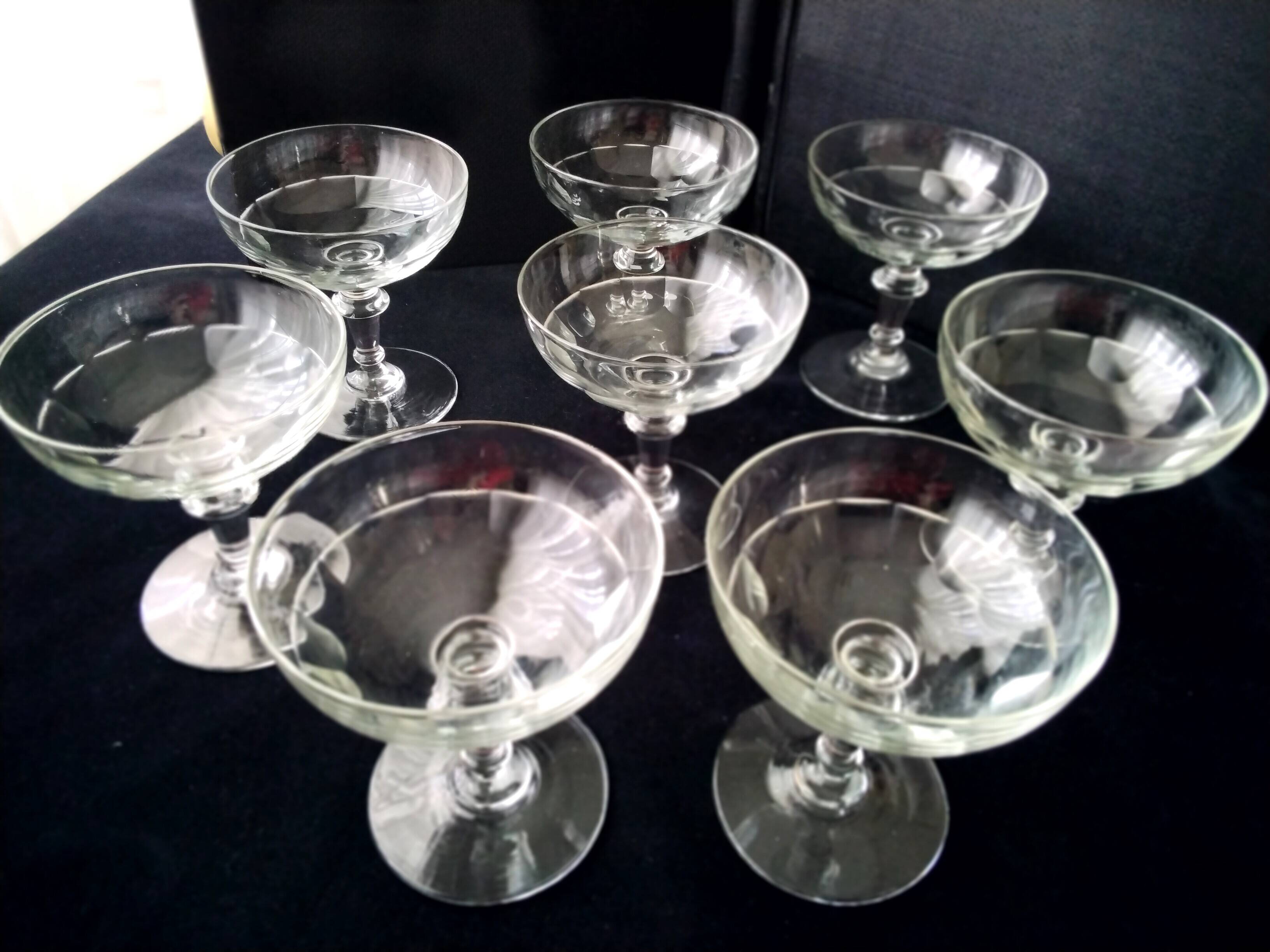 8 old glass champagne glasses