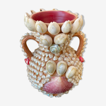 Ceramic vase decorated with shells