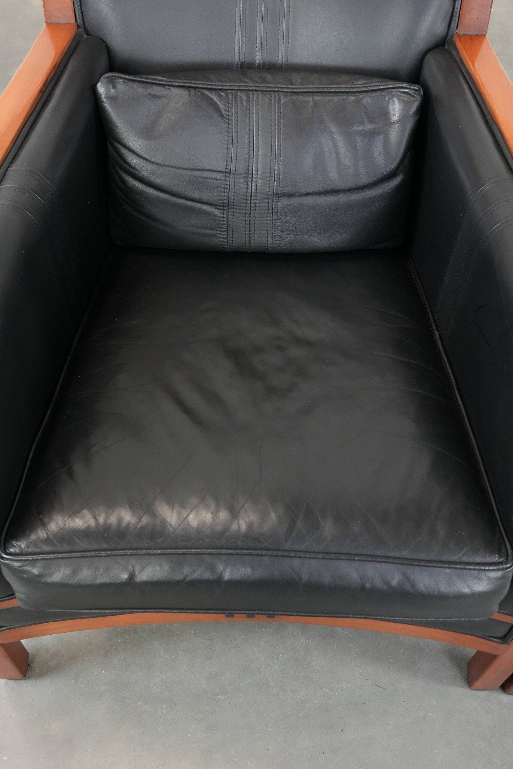 Set of  two black leather Art Deco design armchairs