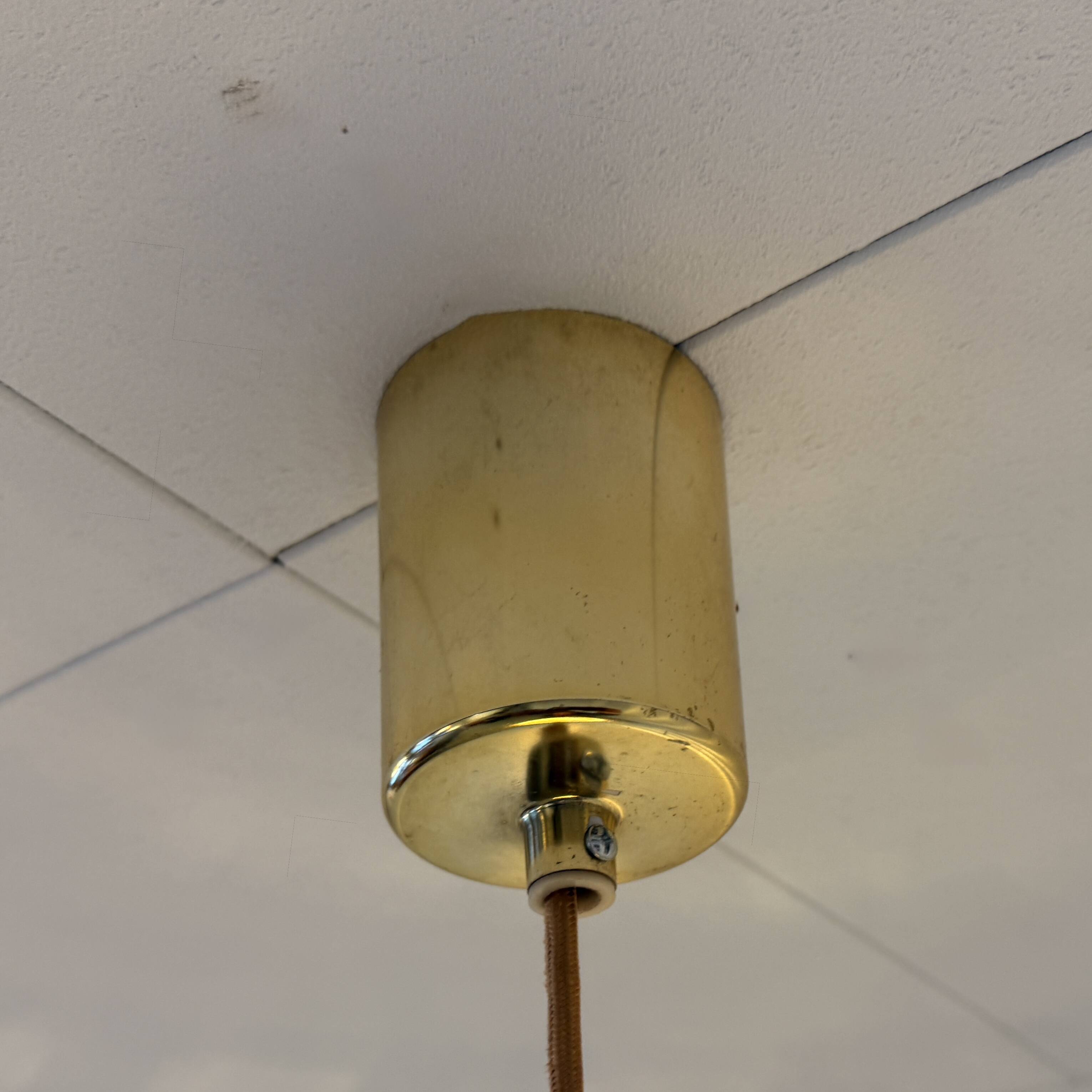 Vintage pendant lamp with amber glass shade