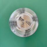 Vintage Art Deco globe wall/ceiling light in white, black, and gold glass.