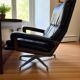 Vintage black leather armchair / Andre Vandenbeuck single seater armchair