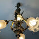 Ancien lustre cage en bronze et 4 feux tulipe