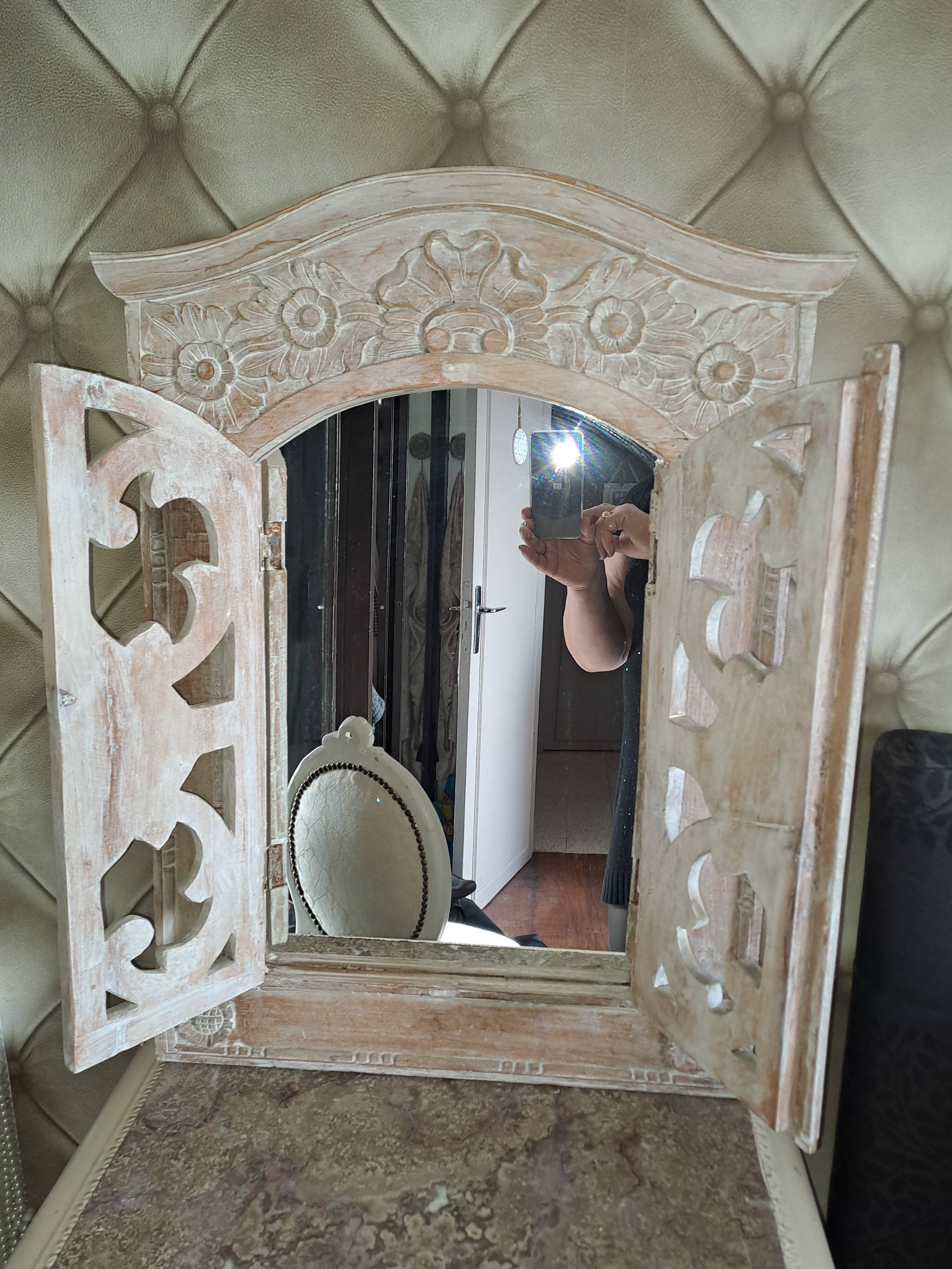 Carved white wood mirror 1990 decorative carved with opening shutters on a square mirror
