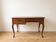 Retro wooden desk with curved legs