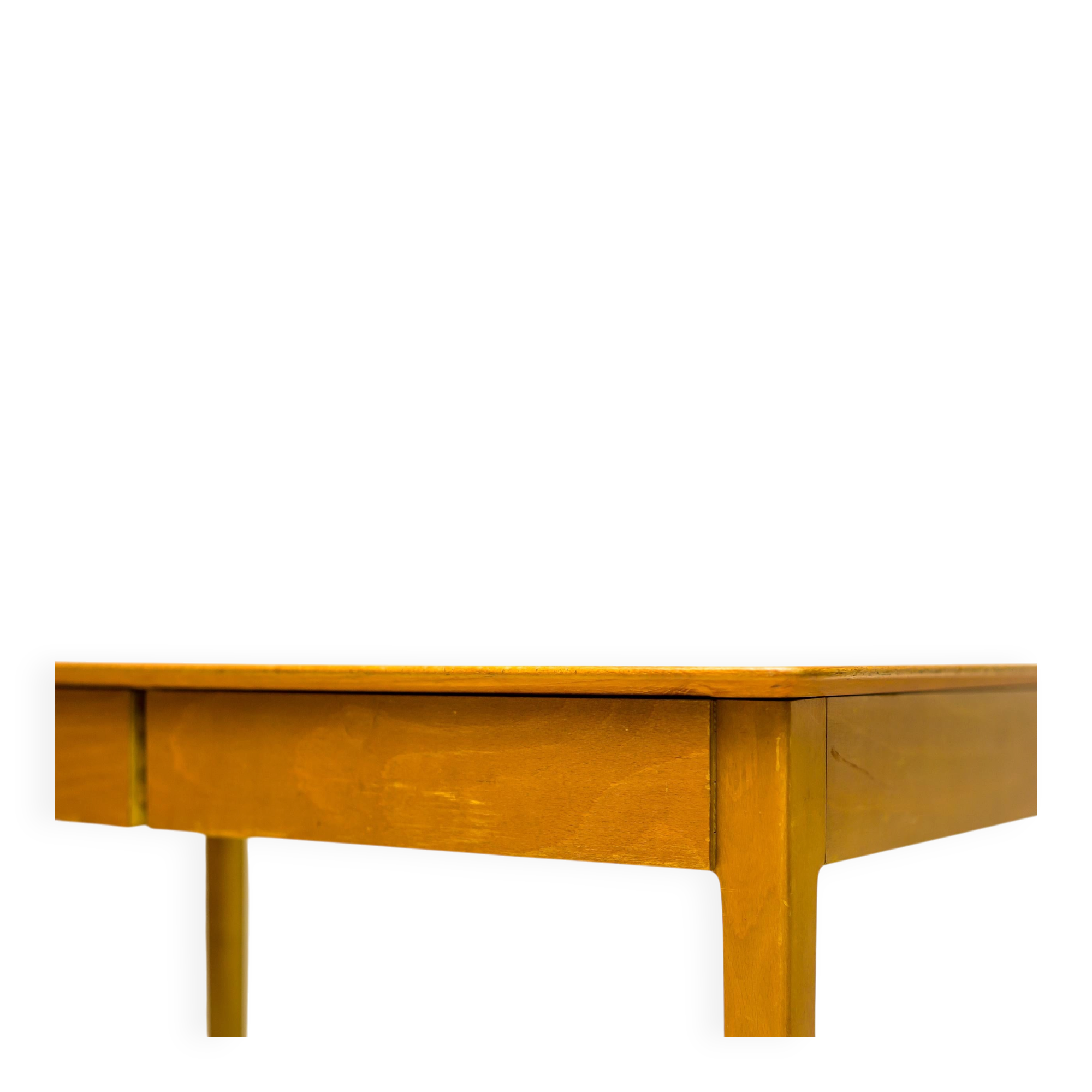 Small maple desk with a laminate top and two drawers, Fritz Hansen, 1950s.