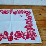 Set of 4 vintage white table napkins with pink flowers.